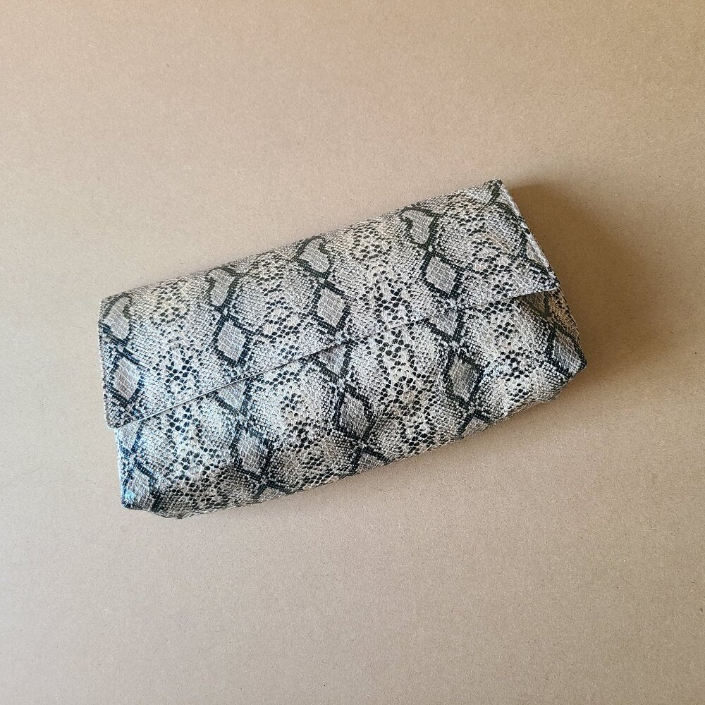 snake print clutch purse